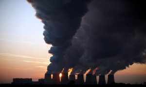 Steam billows from the cooling towers of Vattenfall's Jaenschwalde brown coal power station near Cottbus, Germany, December 2, 2009. REUTERS/Pawel Kopczynski/File Photo